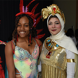 Two students wearing cultural attire.